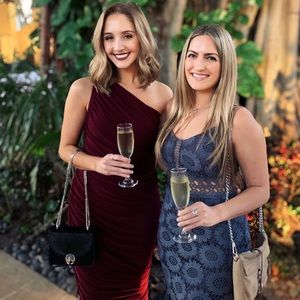 Norma Kamali Diana Dress. Color Plum. Size Medium.